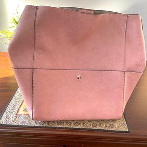 Vegan leather tote with pockets on each side inside and outside